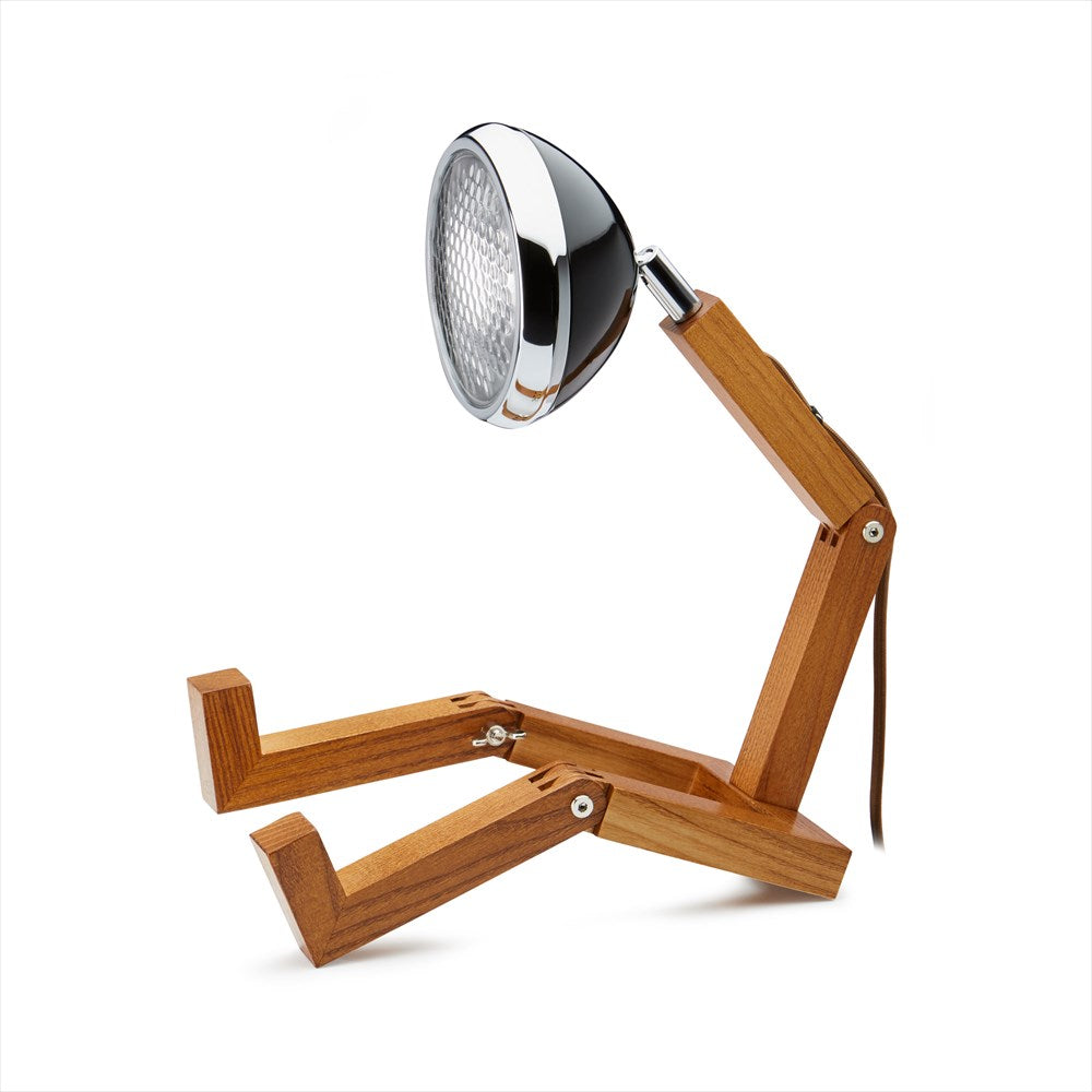Kreativ bordslampa i form av en figur med ben och en lampa som huvud. Färg: Fashion Black.